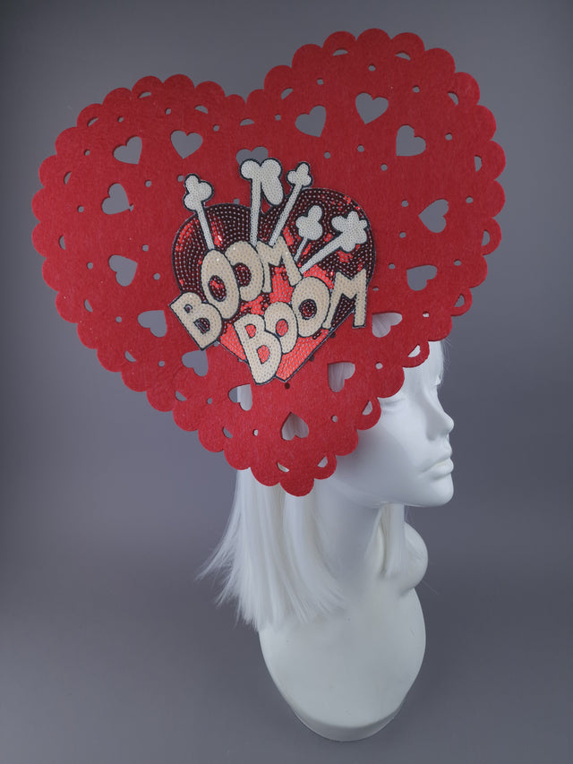 Large red heart headpiece with fun sequin heart on the inside with 'Boom Boom' lettering.