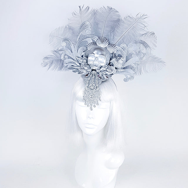 P&SSALE09:feathered skull w/shells and jewels