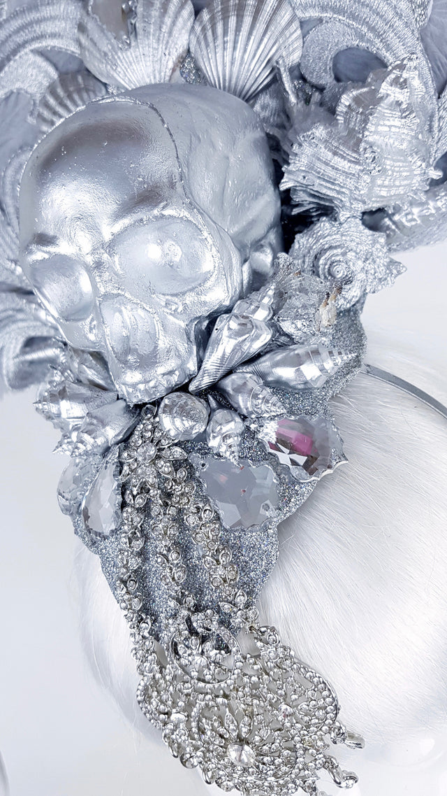 P&SSALE09:feathered skull w/shells and jewels