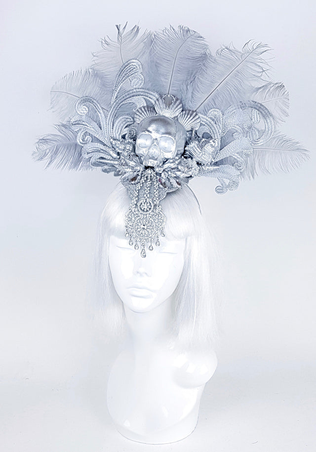 P&SSALE09:feathered skull w/shells and jewels