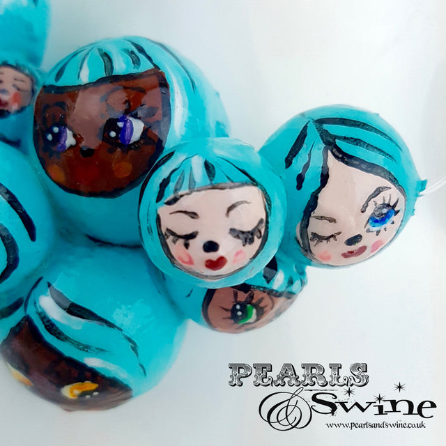 "Aqua Poppets" Blue Bubble DollFace Necklace