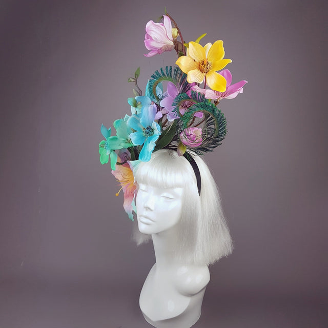 "Éclairer" Rainbow Magnolia Flower & Peacock Feather Headpiece