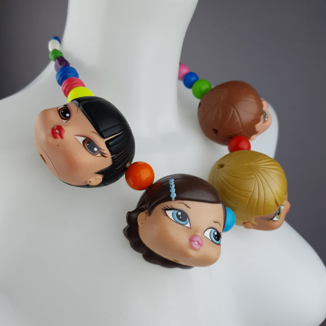 "Many Heads Are Better Than 1" Colourful Doll Head Statement Necklace