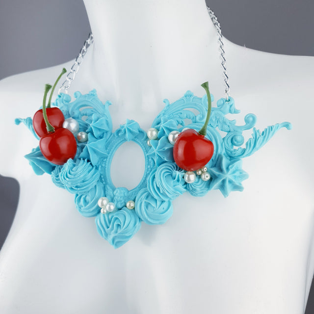 "Licked" Pastel Blue Frosting Icing Cherry Neckpiece
