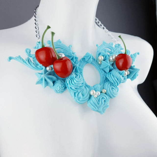 "Licked" Pastel Blue Frosting Icing Cherry Neckpiece