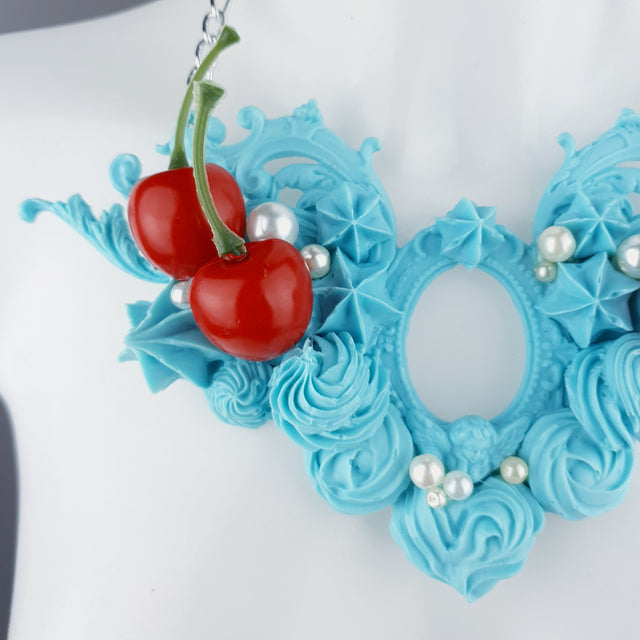 "Licked" Pastel Blue Frosting Icing Cherry Neckpiece