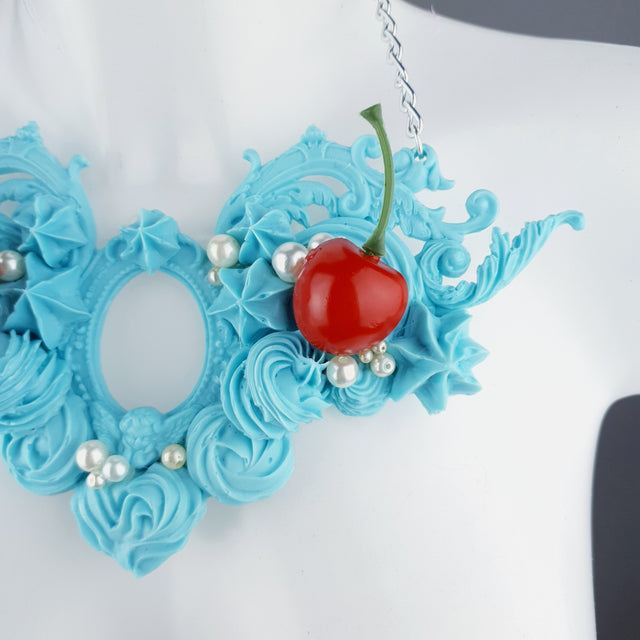 "Licked" Pastel Blue Frosting Icing Cherry Neckpiece