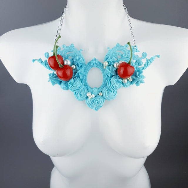 "Licked" Pastel Blue Frosting Icing Cherry Neckpiece