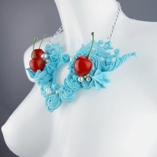 "Licked" Pastel Blue Frosting Icing Cherry Neckpiece