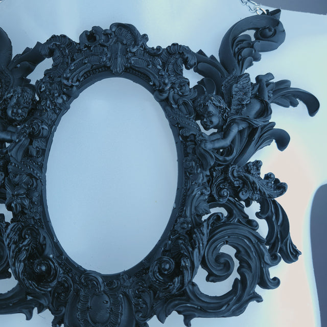 "Carminia" Black Filigree Cherub Frame Neckpiece