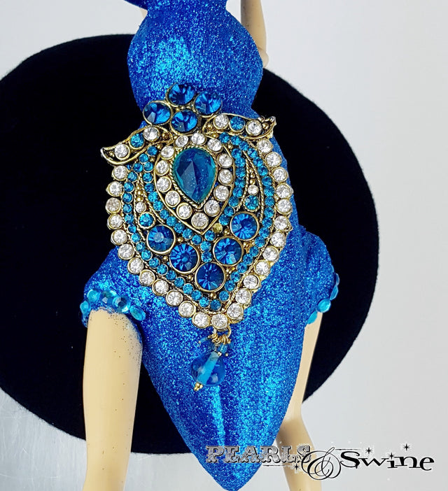 Jewel encrusted doll face hat