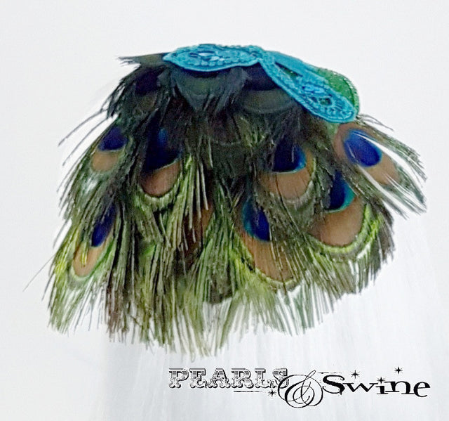 Sparkling peacock feather hat