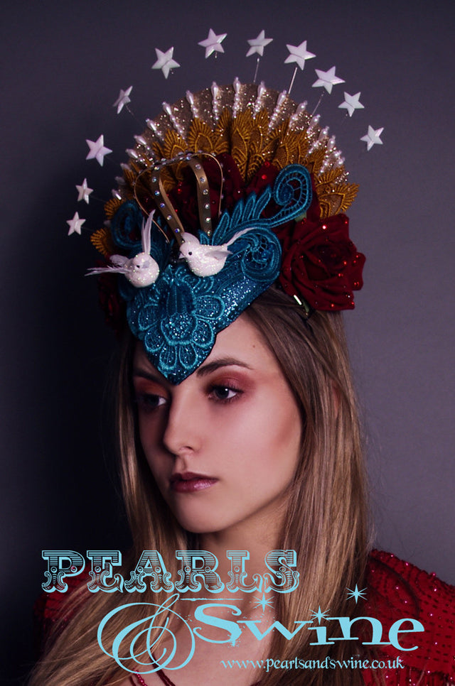 Virgin Mary Headdress "Queen of Angels" The Virgin Mary headdress has turquoise glitter lace, roses, doves, stars, beading and a lush crown covered in crystals with a hand-moulded felt base set on a headband. A piece of wearable art.