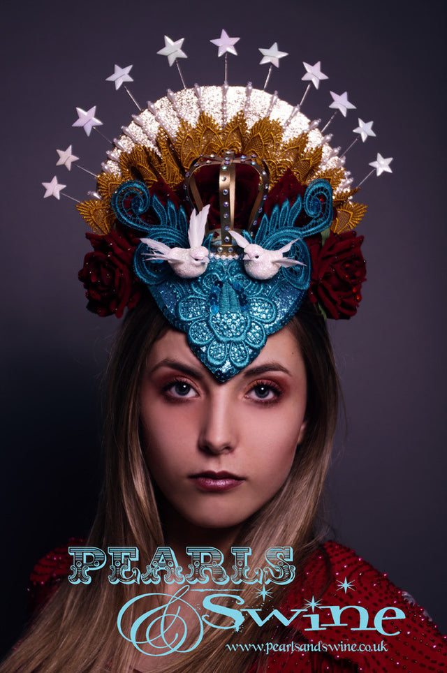 Virgin Mary Headdress "Queen of Angels" The Virgin Mary headdress has turquoise glitter lace, roses, doves, stars, beading and a lush crown covered in crystals with a hand-moulded felt base set on a headband. A piece of wearable art.