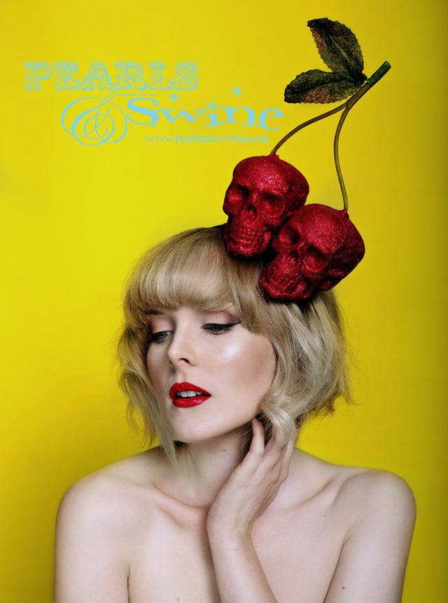 Red hand glittered skull 'cherries' on a black matte satin headband. Limited edition! Perfect for a Rock & Roll Bride, would looked amazing with a little black dress with red heels or a red polka dot 50's dress.