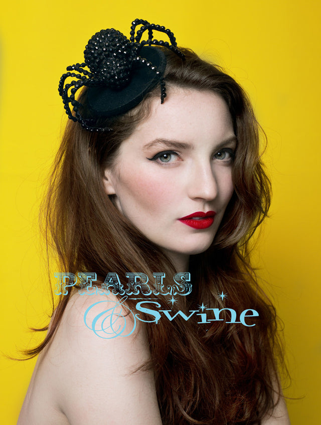 Spider Fascinator "The Glamorous Spider" A large black glittered and hand-jewelled spider, set on a felt fascinator base which is edged in black velvet ribbon. Attaches with a comb and adjustable hat elastic. Perfect headpiece for Halloween, goth fashion and spider lovers.