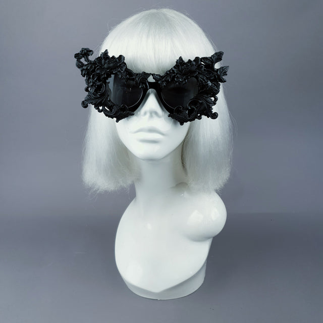 Oversized hand-decorated black fancy filigree ornate sunglasses.