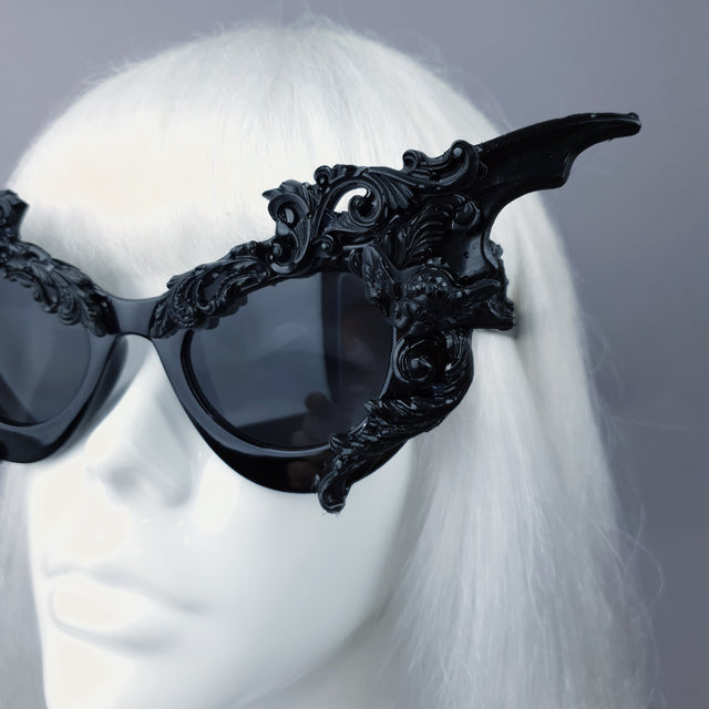 Close-up Black Filigree Ornate Bat Wing & Cherub Sunglasses