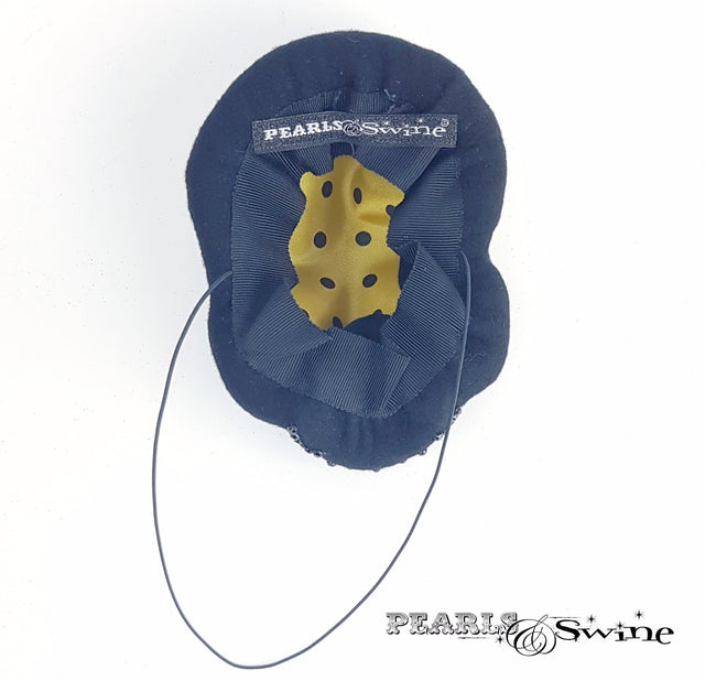 Yellow polka dot lined skull hat