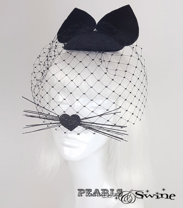 Quirky black velvet cat ear veil fascinator
