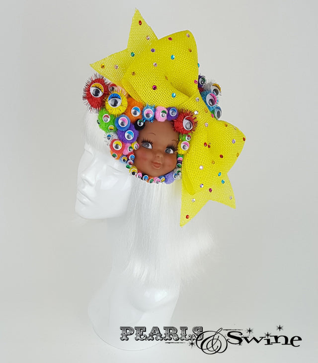 bow pom pom wiggly eye doll face fascinator