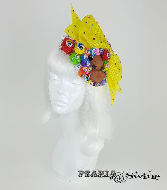 bow pom pom wiggly eye doll face surreal fascinator UK