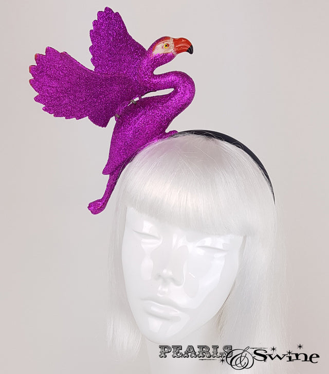 fuchsia pink glittered flamingo set on a black satin headband