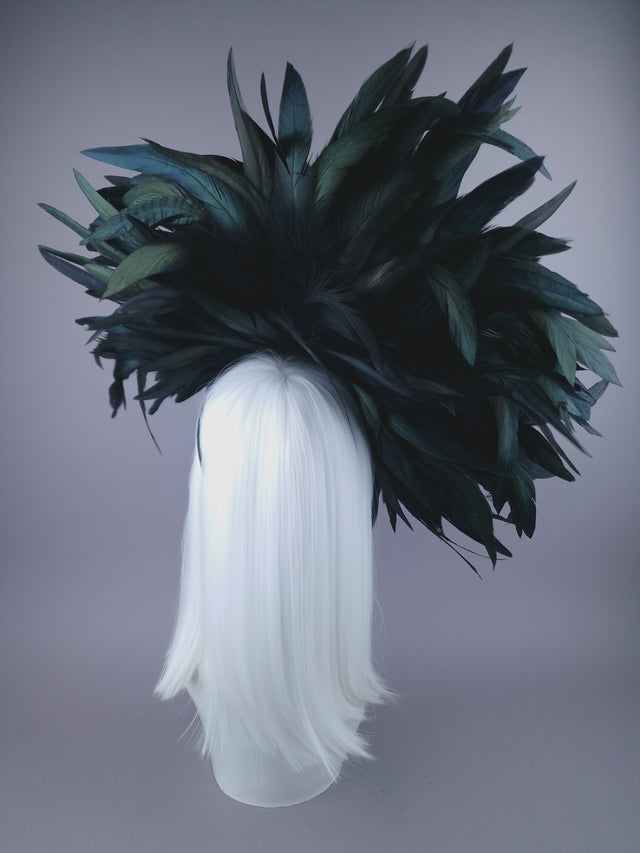 back shot of large black iredescent feathers set on a head band