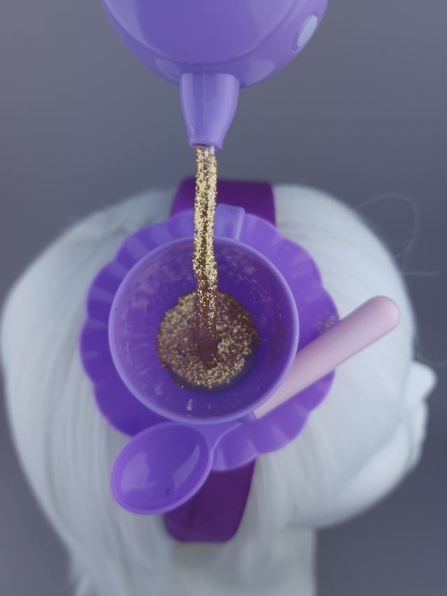 Pearls & Swine Headpiece Purple Teapot Pouring into Teacup