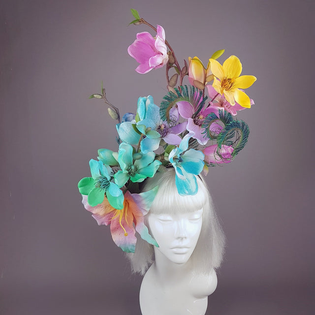 "Éclairer" Rainbow Magnolia Flower & Peacock Feather Headpiece