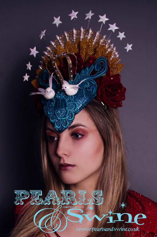 Virgin Mary Headdress "Queen of Angels"  The Virgin Mary headdress has turquoise glitter lace, roses, doves, stars, beading and a lush crown covered in crystals with a hand-moulded felt base set on a headband.   A piece of wearable art. 