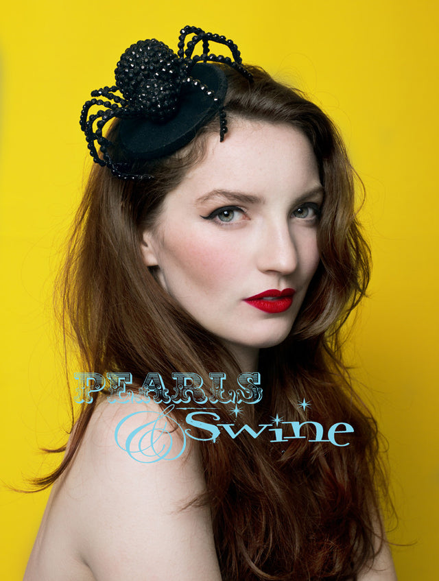Spider Fascinator "The Glamorous Spider"   A large black glittered and hand-jewelled spider, set on a felt fascinator base which is edged in black velvet ribbon. Attaches with a comb and adjustable hat elastic. Perfect headpiece for Halloween, goth fashion and spider lovers.