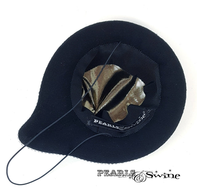 Satin lined quirky speech bubble hat
